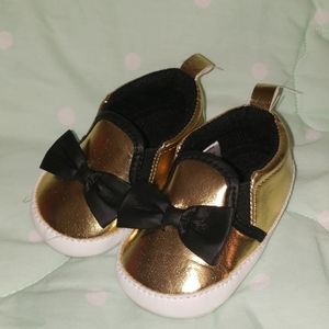 Size 0-6m gold slip on
